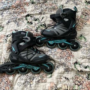 SOLD - Black & blue street roller skates